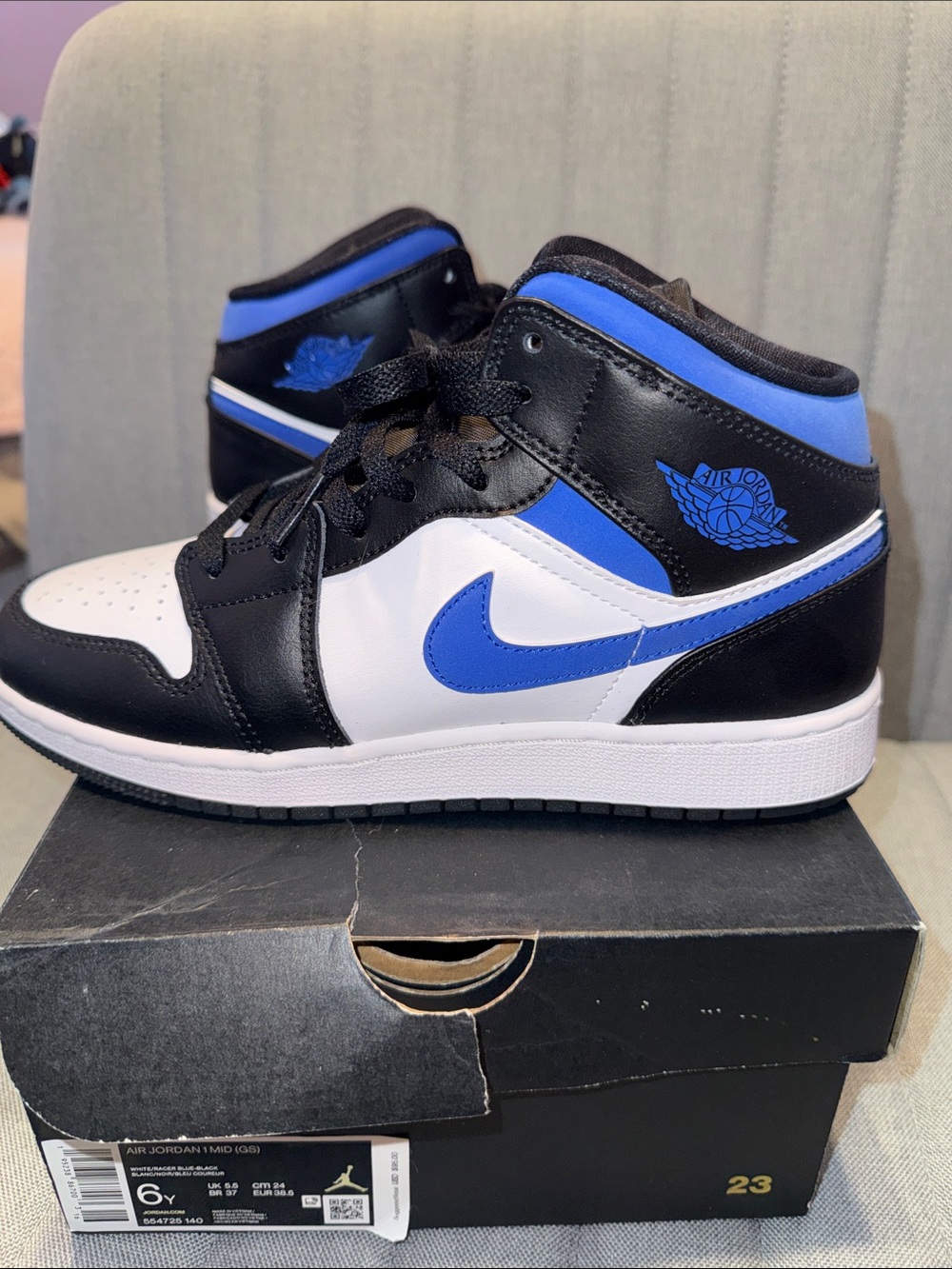 Jordan Men’s Mid Sneakers in Black, White & Royal Blue